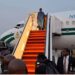 Tinubu returns to Abuja after France, South Africa trips